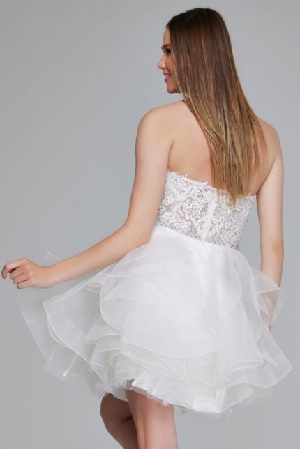 Model wearing K24371 white dress with strapless lace bodice, front view.