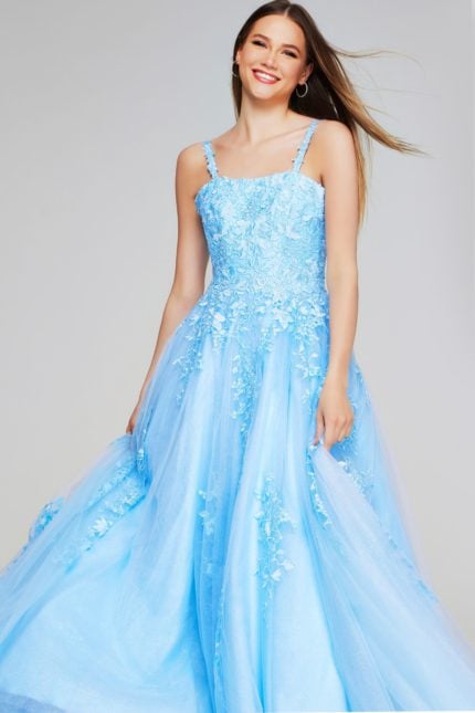 Model wearing Jovani K38098 light blue dress with intricate detailing from the front