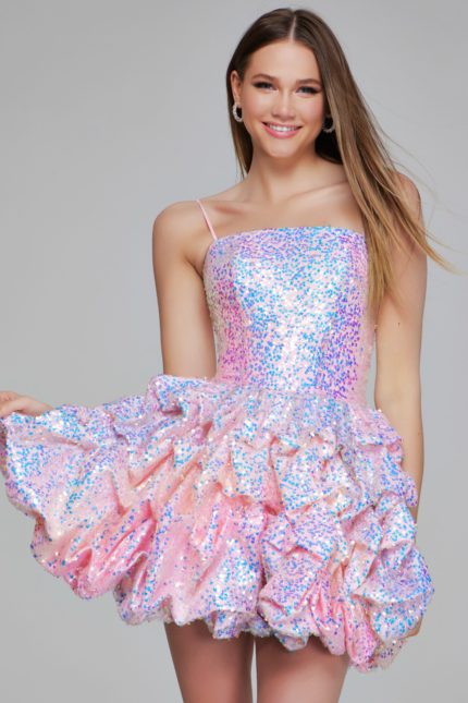 Model wearing K38108 dazzling pink mini dress with sequined bodice and ruffled skirt.