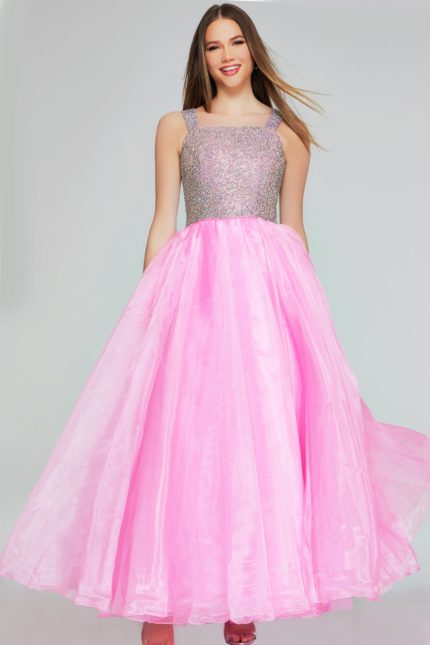 Model wearing Jovani K38261 pink dress with embellished bodice, front view.