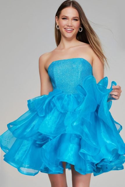 Model wearing Jovani K39312 dress in blue, front view