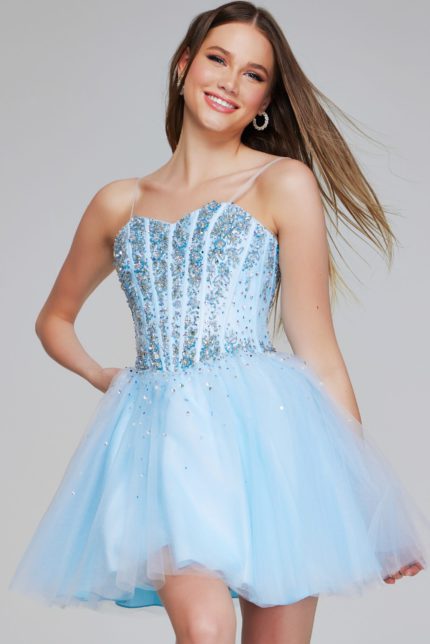 Model wearing Jovani K62533 blue dress with beaded bodice and A-line silhouette, front view.