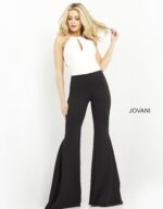 Model in Jovani M02807 jumpsuit displaying sleek silhouette and keyhole feature.