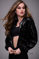 Model wearing M52082 black sequin crop jacket side view