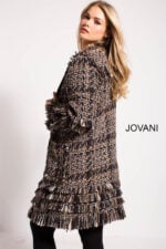 Back view of model in Jovani M54805 tweed coat with textured detailing in multi-color.