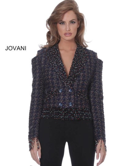 Model showcasing Jovani M61912 front view with multicolored fabric and open shoulder.