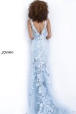 model wearing Jovani 60283 blue dress with floral applique, back view