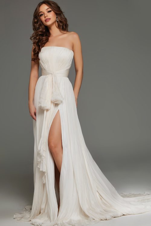 Strapless pleated bridal gown with waist bow and elegant flowing train S04373