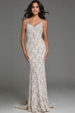 Model wearing S60534 elegant white lace gown with V-neckline, front view.