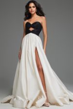 model wearing S67083 black and white gown with high slit and strapless bodice