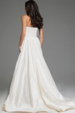 back view of model wearing S67083 white full-length gown with A-line silhouette