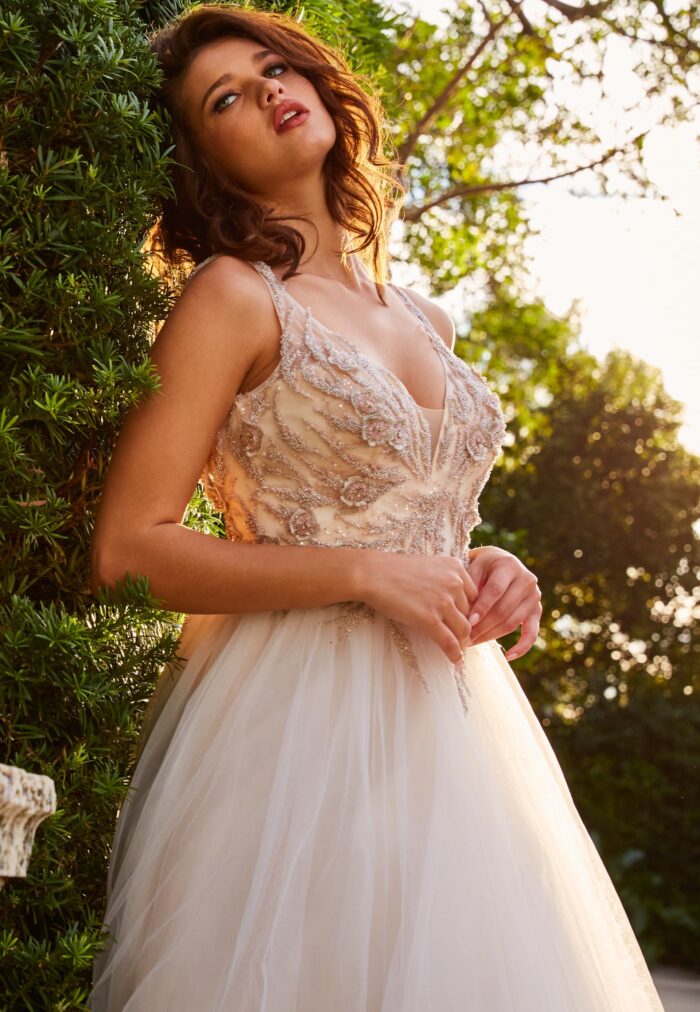 Model wearing JB05781 Ivory Blush Embellished Bodice Wedding Ballgown