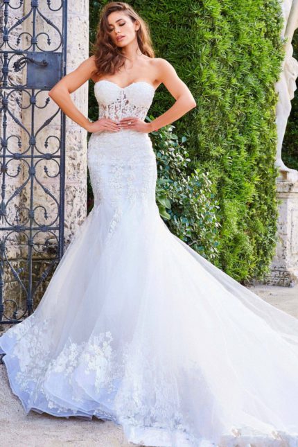 Model wearing Jovani JB07260 dress with a sweetheart neckline and mermaid silhouette in white