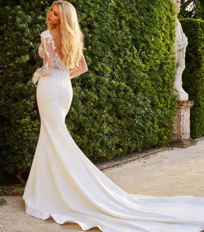 Model wearing JB07632 Ivory Nude Long Sleeve Lace Bodice Bridal Dress