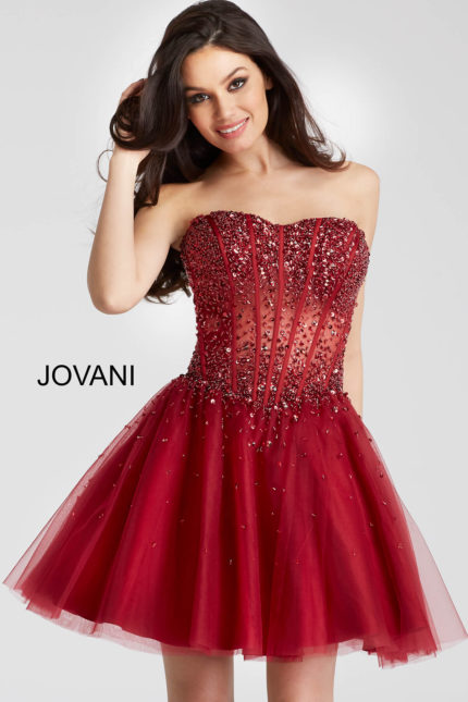 Model wearing Jovani 55142 burgundy short A-line dress with sweetheart neckline and embellishments, front view.