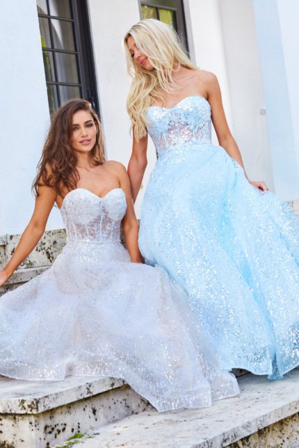 Model wearing Jovani 08417 A-line dress in blue and ivory with sweetheart neckline.