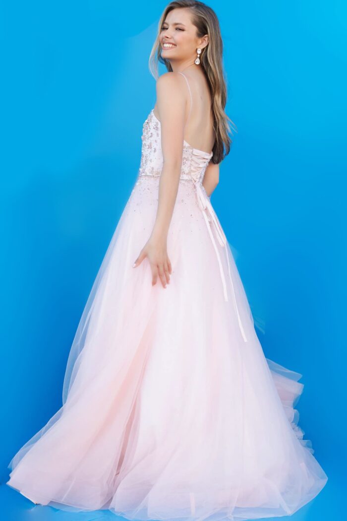 Model wearing Jovani K3620 Pink Spaghetti Strap Long A Line Kids Dress