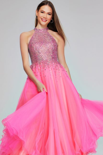 Model wearing k38284 hot pink dress with high halter neckline and sparkling details, full length front view.