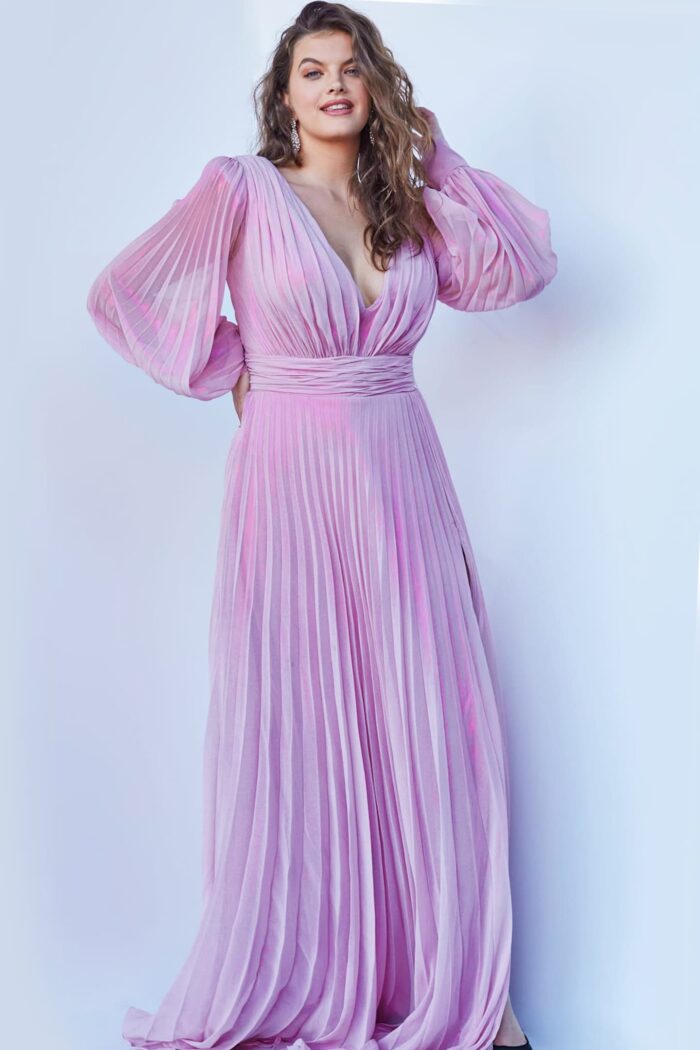 Model wearing Jovani 06221 Pink Long Sleeve V Neck Maxi Plus Size Dress
